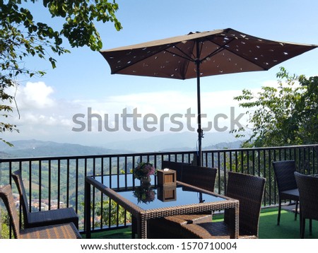 Mountain view dining table,Seat background serving customers sitting and can see the views of the mountains  around and take pictures without asking permission. Select focus