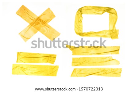 Set of yellow tapes on white background. Torn horizontal and different size yellow sticky tape, adhesive pieces.
