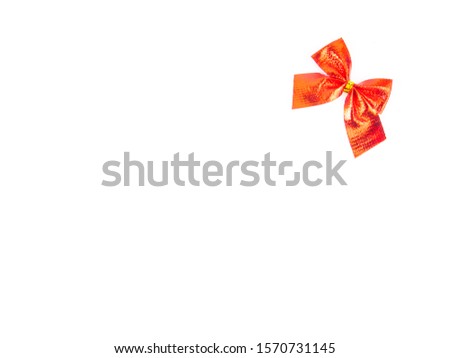 Red bows on a white background. Valentine's Day. Holidays. Card. Place for text. Background image.