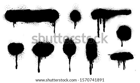 Spray Paint Vector Elements isolated on White Background, Lines and Drips Black ink splatters, Ink blots set, Street style. Royalty-Free Stock Photo #1570741891