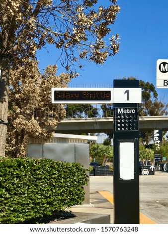 Information board with the name of the bus route at the bus stop