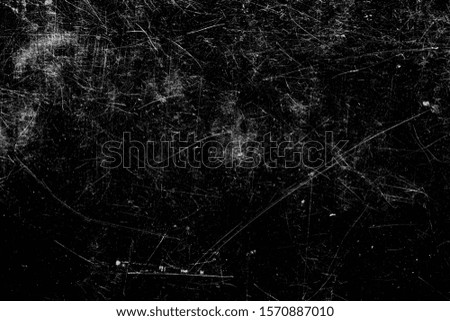 glass scratched on a black background. texture for design