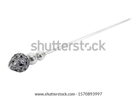 Silver hair barrette isolated on white background. Chrome silver hairpin with lotus flower design pattern isolated