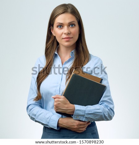 confident woman teacher with books. isolated female portrait.