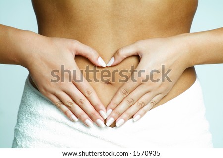 Woman's Fingers Touching her body parts, heart shaped fingers Royalty-Free Stock Photo #1570935