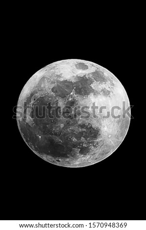 Close up picture of the big, full moon on the clear night sky, black background of Dalat, Lam Dong, Vietnam