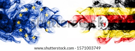 Eu, European Union vs Uganda, Ugandan smoky mystic flags placed side by side. Thick colored silky abstract smoke flags combination