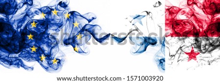 Eu, European Union vs Panama smoky mystic flags placed side by side. Thick colored silky abstract smoke flags combination