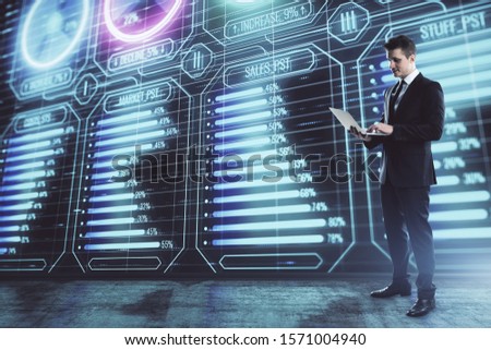 Businessman standing with business theme hologram. Multi exposure. Concept of analysis