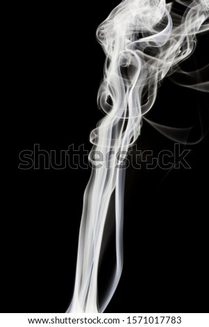 white smoke on black background. Royalty-Free Stock Photo #1571017783