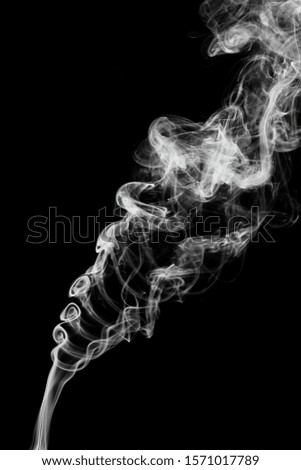 white smoke on black background. Royalty-Free Stock Photo #1571017789