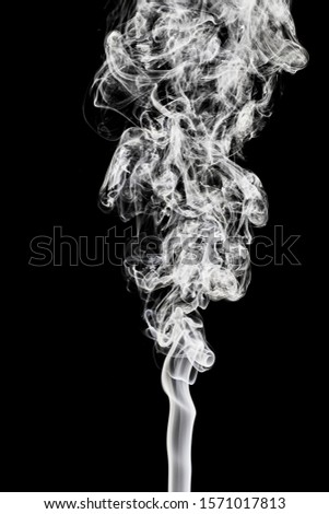 white smoke on black background. Royalty-Free Stock Photo #1571017813