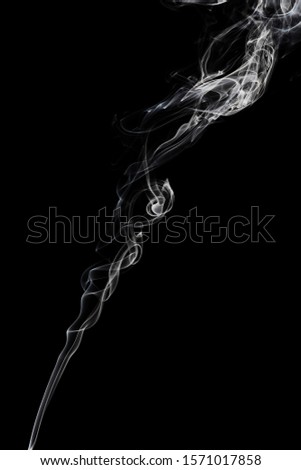 white smoke on black background. Royalty-Free Stock Photo #1571017858
