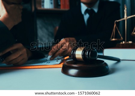 Law and Legal services concept. lawyer judge or Auction show gavel in the office.