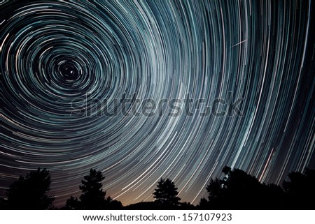 beautiful sky at night with startrails Royalty-Free Stock Photo #157107923