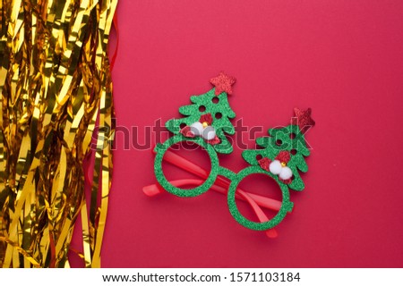 Funny eyeglasses in the form of Christmas tree. Merry Christmas and Happy New Year decoration. Place for design