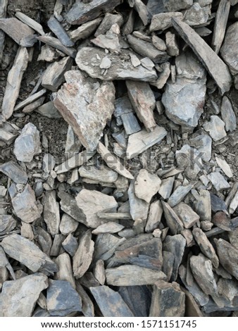 Background image of gray stones of different sizes
