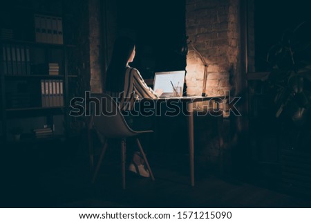 Full length body size back rear view photo of focused concentrated woman working on development of new software for her corporation