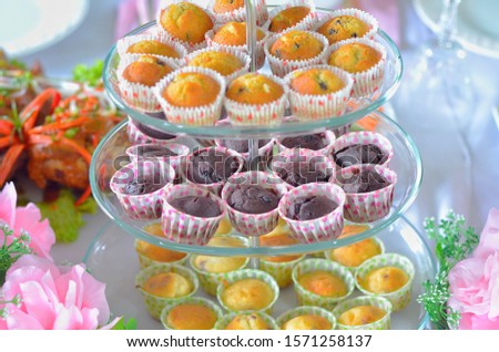 cupcakes are made with a variety of flavors and carvings-image