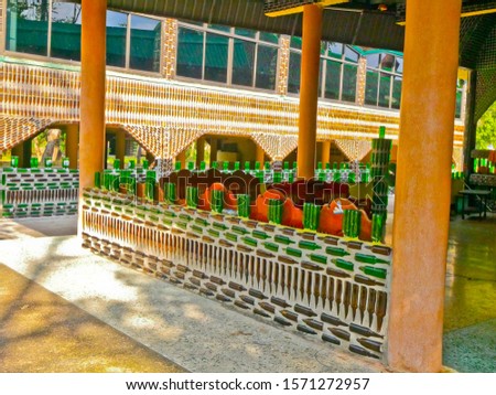 This is  amazing  million bottles temple. The part of building made withe bottles, 
bottles in temple about 1,500,000 peaces.  it's the best way to reused the bottles  again.