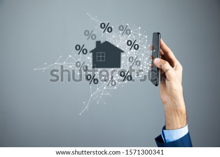 businessman and percent icon with home