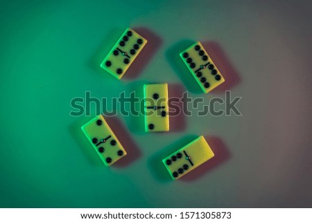 Beautiful vintage dominoes in the color light. Background banner texture. Top View.