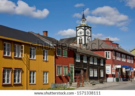 Row of houses and church tower in Roros, Sor-Trondelag, Trondelag, Norway