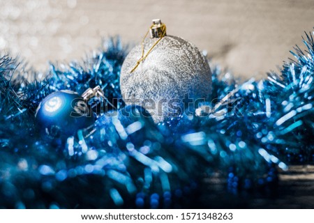 Toys on a Christmas tree, background, blue bokeh.