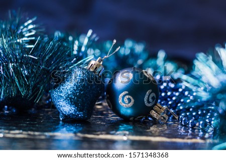 Toys on a Christmas tree, background, blue bokeh.