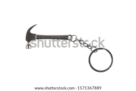 steel hammer, key chain isolated on a white background