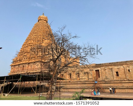 Brihadeeswarar temple, ancient Hindu temple tower in Thanjavur, Tamil nadu, India. Ancient temple with blue sky background