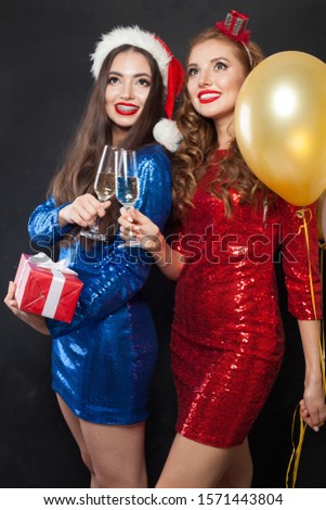 Happy Christmas women in party dress. Merry Christmas and Happy New Years concept