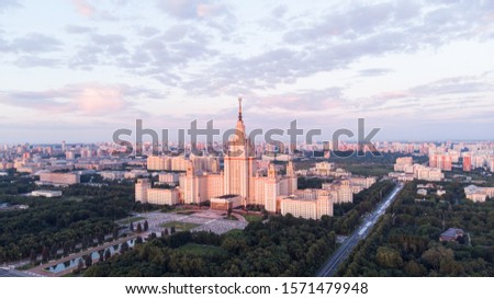 Moscow State University sunrise aerial drone shot. Moscow Russia beautiful morning sun scenery, magnificent iconic architecture, historical image
