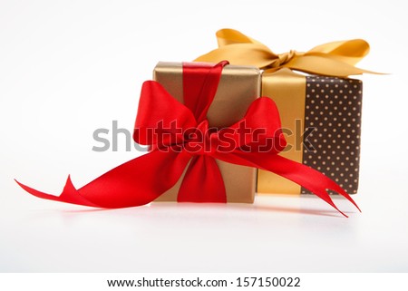 Two gift box, Gold and brown with red and gold ribbon