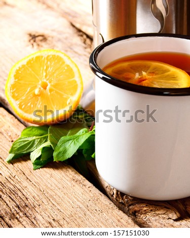 Black tea with a lemon.