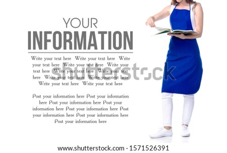 Woman in an apron in the hands book cooking recipes on a white background. Isolation, space for text
