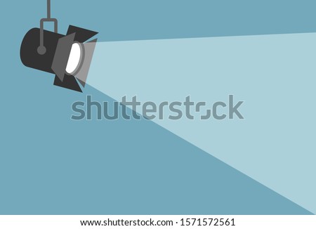 Spotlight shining flat illustration. Movie spotlight on blue background Royalty-Free Stock Photo #1571572561