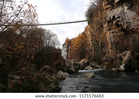Autumn, river, stream and waterfall scene. 