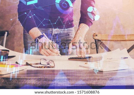 FOREX chart multi exposure with businessman office on background.