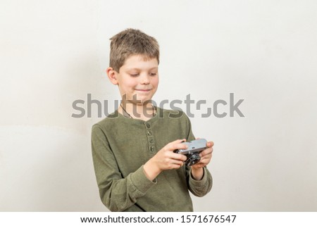 young guy holds film cameras human emotions