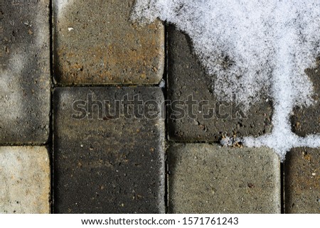 Top down of patio pattern with snow
