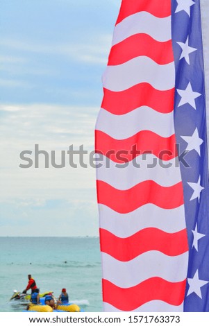 Beautiful US National Flag in Tropical Beach