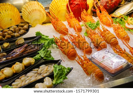 Fresh seafood in the tourist night market Royalty-Free Stock Photo #1571799301