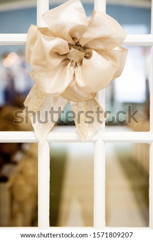 A closeup shot of a decorative ornament at a wedding in a church