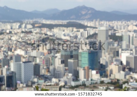 View of city blurred background with skyscraper buildings