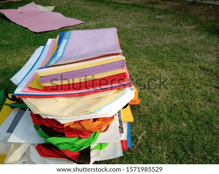 above view of  ECO Bags, bundle of Non Woven Bags on Green Grass
