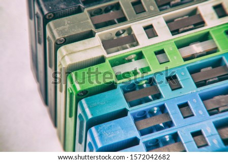 Close up set of old audio tapes,
Stack vintage compact cassette tape