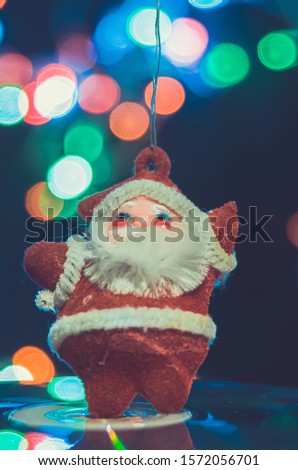 Santa Clause Christmas post card with bokeh xmas lights background