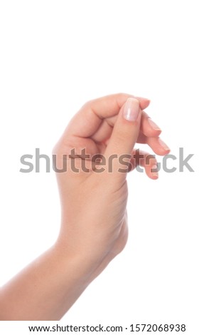 Woman's hand measuring invisible items on white background