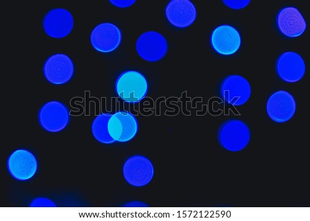 blue bokeh on a black background